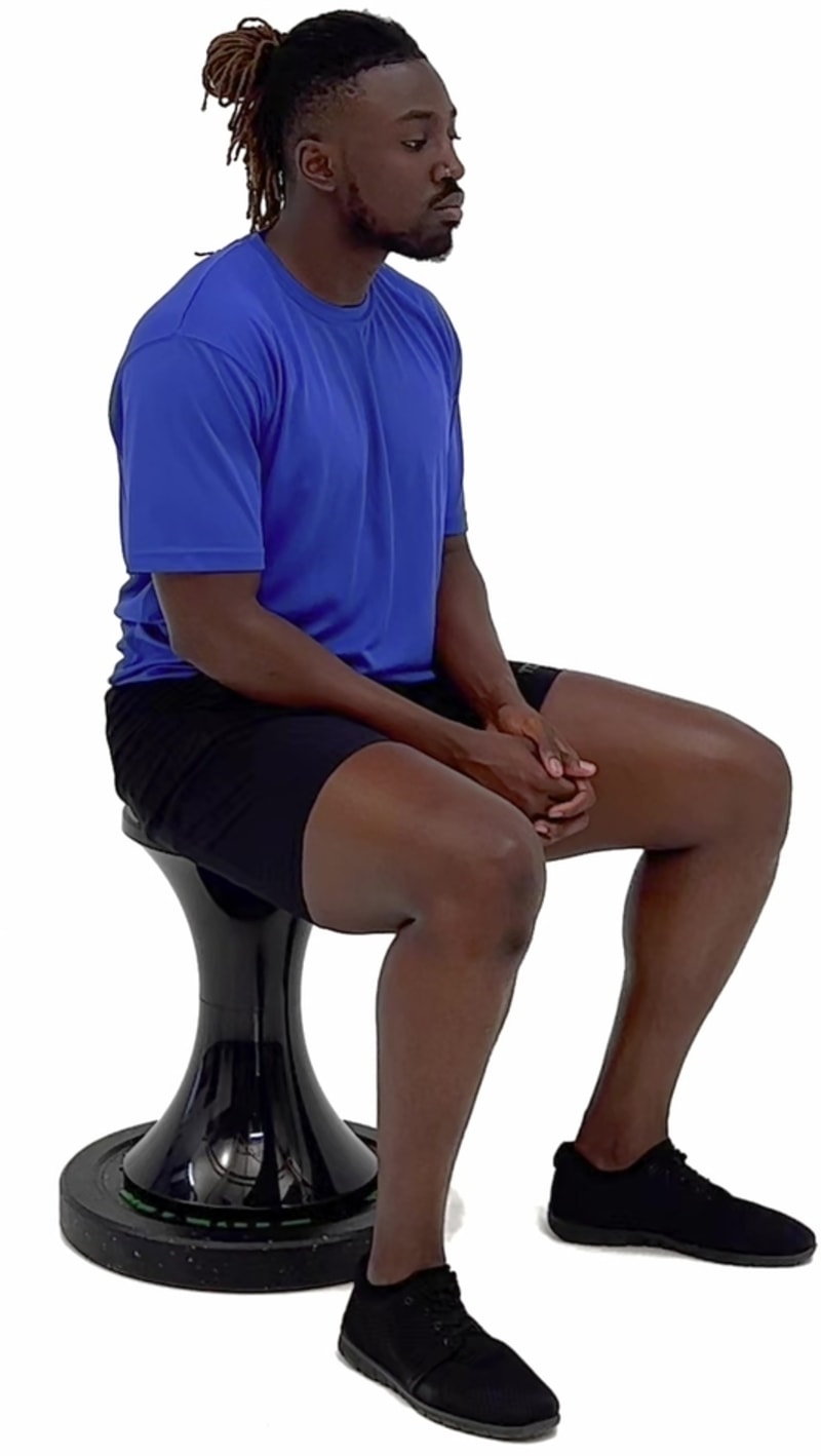 Demonstration of chin tuck (cervical retraction) exercise technique